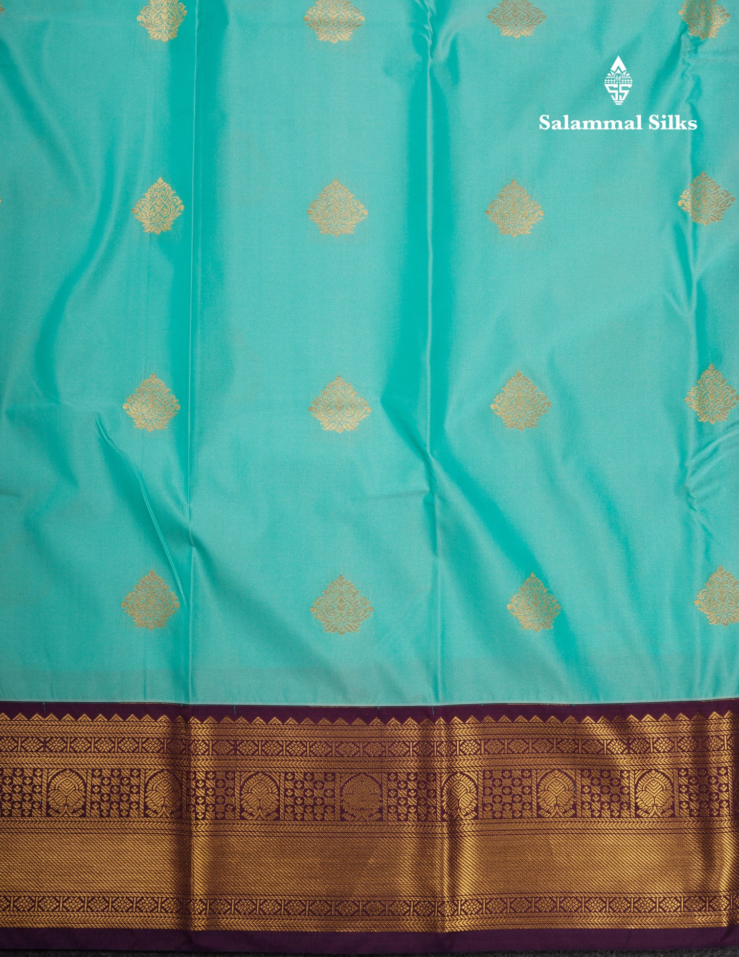 Sea Green Semi Silk Saree With Contrast Purple Traditional Border