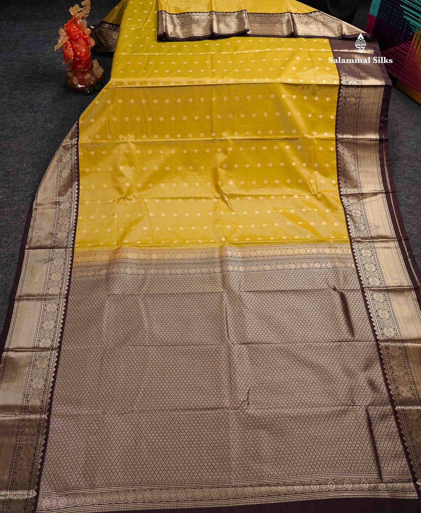 Semi Silk Saree - Olive Mustard Yellow Butta With Vaira Oosi Lines Along With Contrast Dark Brown Border