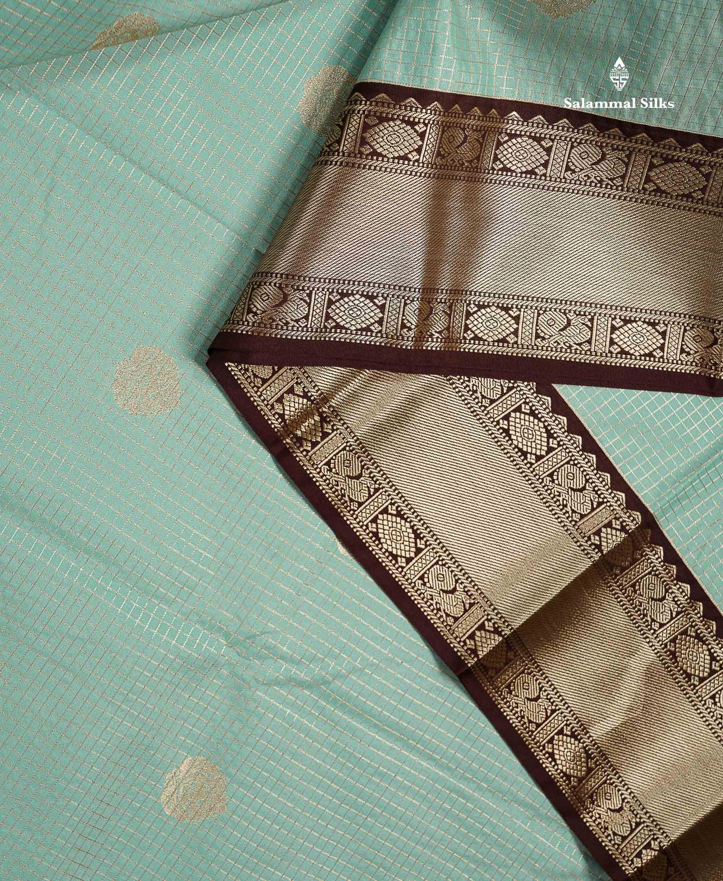 Semi Silk Saree -  Ice Blue Butta With Small Checks Along With Contrast Dark Brown Traditional Border