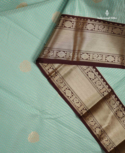 Semi Silk Saree -  Ice Blue Butta With Small Checks Along With Contrast Dark Brown Traditional Border