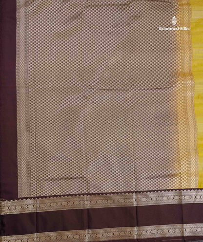 Semi Silk Saree - Manthulir Yellow Butta With Alai Vaira Oosi Lines Along With Contrast Dark Brown Traditional Rettapet Border
