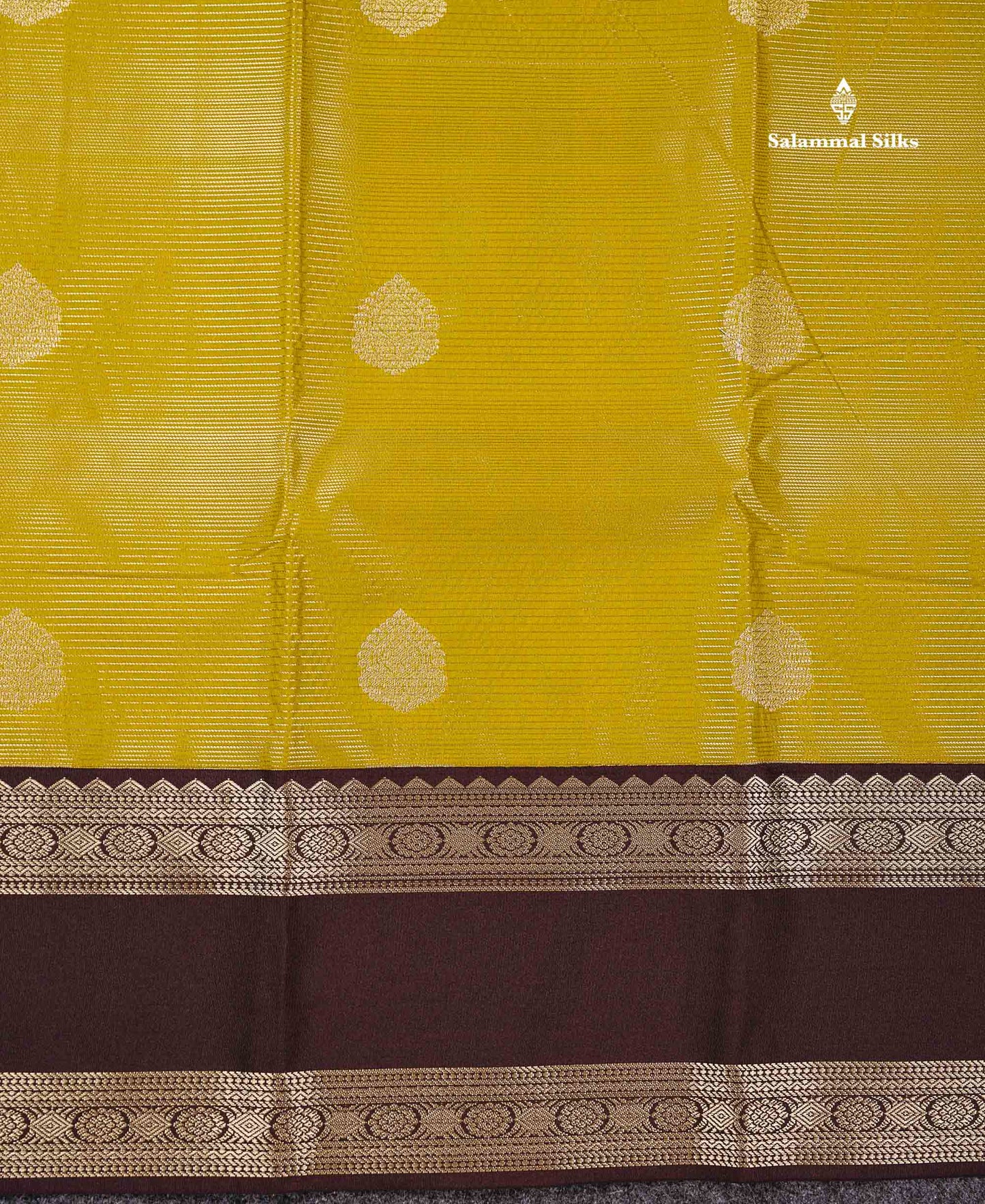 Semi Silk Saree - Manthulir Yellow Butta With Alai Vaira Oosi Lines Along With Contrast Dark Brown Traditional Rettapet Border
