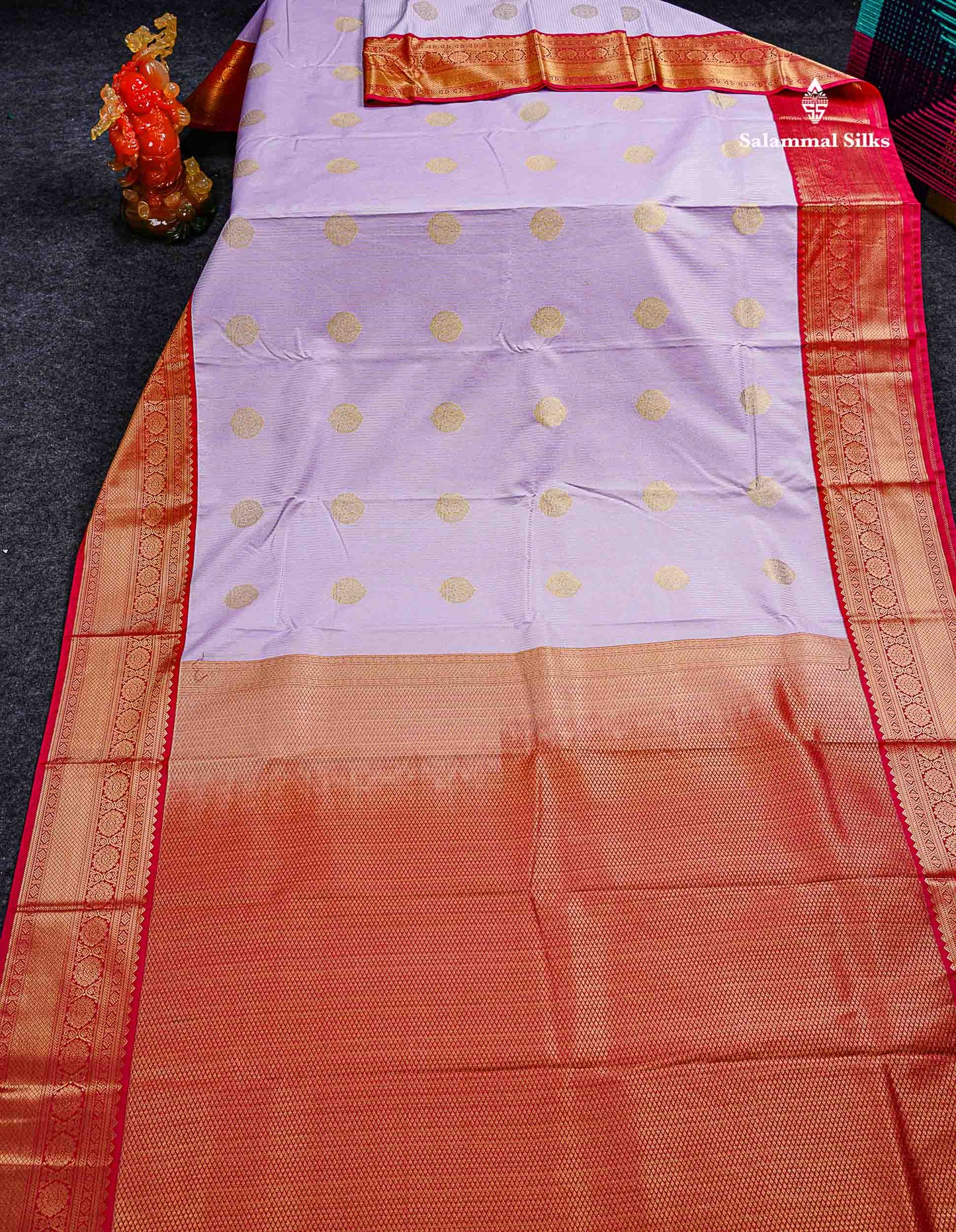 Semi Silk Saree - Light Lavender Butta With Lines Along With Contrast Chilly Red Traditional Border