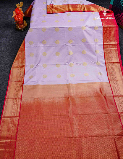 Semi Silk Saree - Light Lavender Butta With Lines Along With Contrast Chilly Red Traditional Border