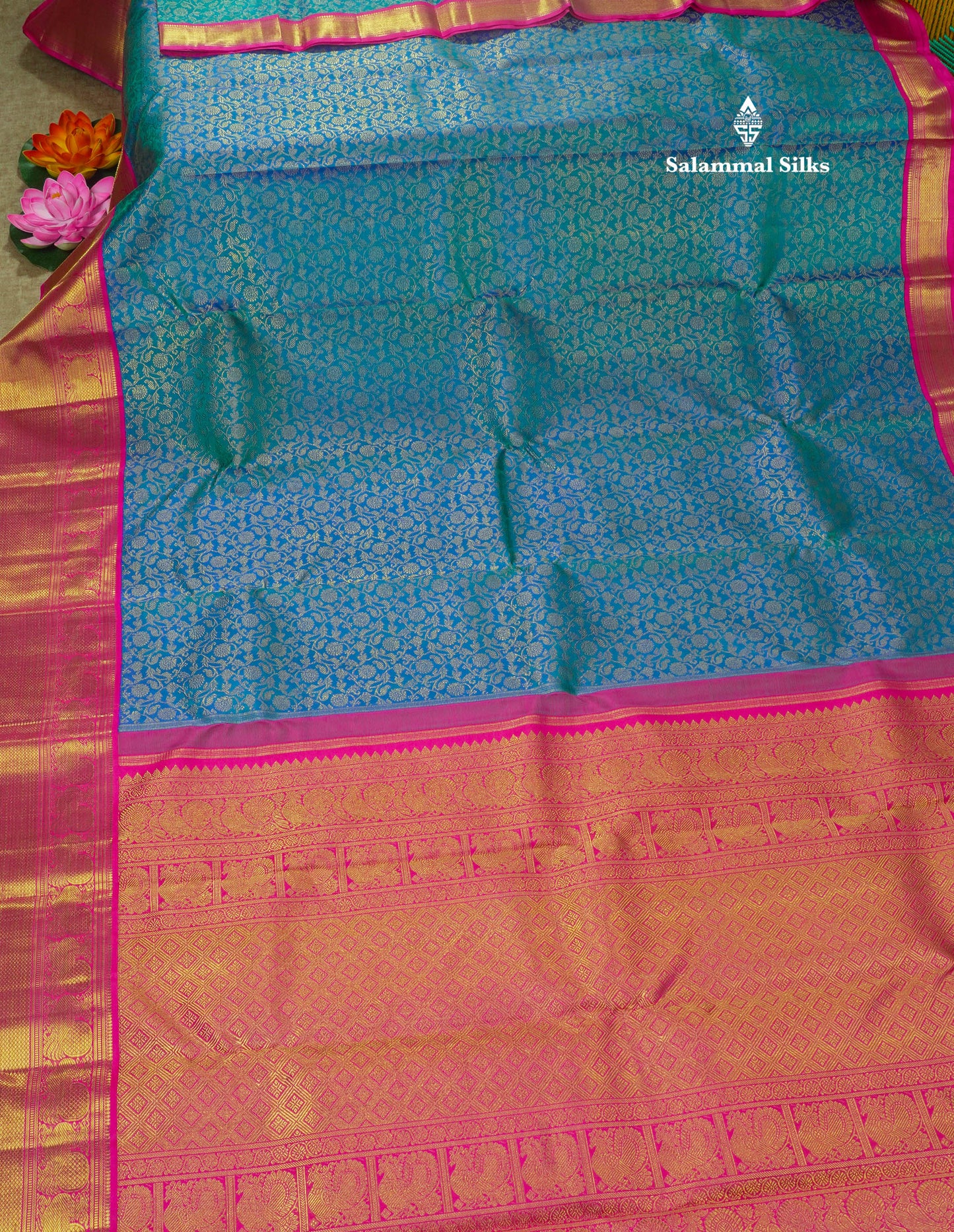 Pure zari Peacock Blue Pure Kanjivaram Silk Saree with Contrast Pink Traditional Border