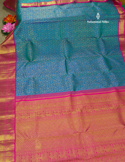 Pure zari Peacock Blue Pure Kanjivaram Silk Saree with Contrast Pink Traditional Border