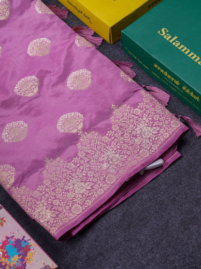Beautiful Green Semi Raw Silk Saree With Fancy Border