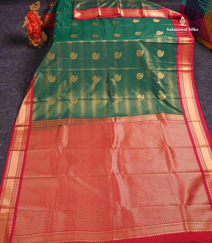 Semi Silk Saree -  Bottle Green Mango Butta With Alai Vaira Oosi Lines Along With Contrast Redish Pink Traditional Small Border