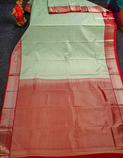 Semi Silk Saree - Light Pista Green Butta With Tiny Vaira Oosi Checks Along With Contrast Red Traditional Border