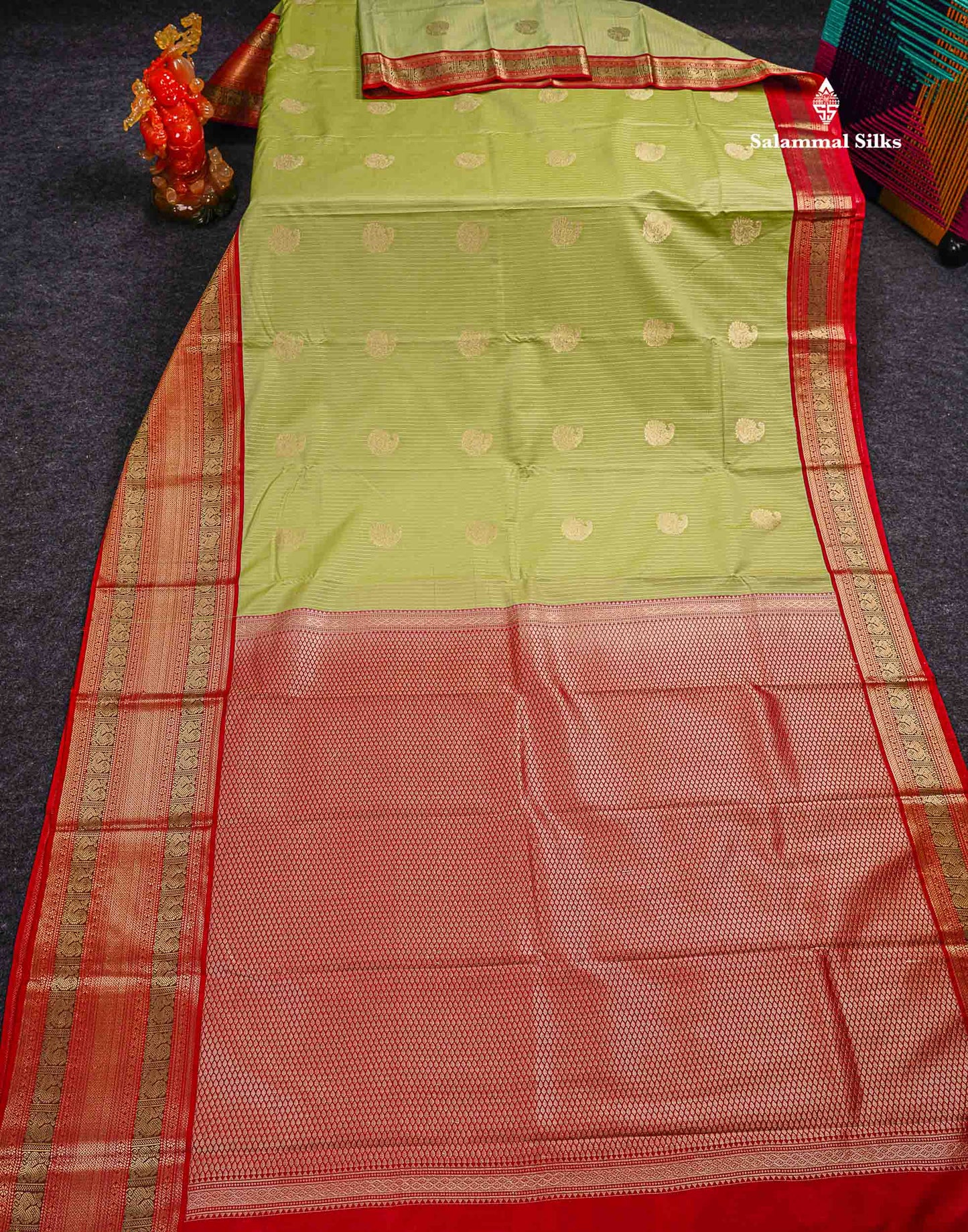 Semi Silk Saree -  Pista Green Zari Lines Butta With Contrast Redish Pink Traditional Evening Morning Border