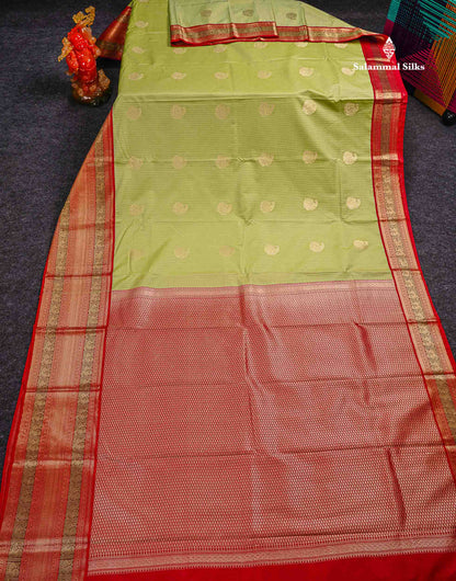 Semi Silk Saree -  Pista Green Zari Lines Butta With Contrast Redish Pink Traditional Evening Morning Border
