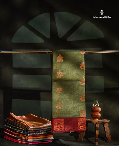 Beautiful Elaichi Green Zari Butta Kota Cotton Saree With Contrast Dark Maroon Fancy Border