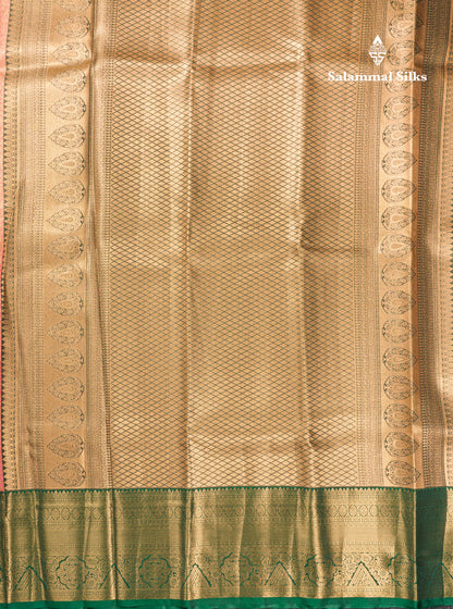 Pinkish Peach Bridal Tissue Semi Silk Saree With Contrast Bottle Green Border