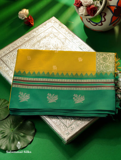 Beautiful Lemon Yellow Zari Butta Semi Silk Cotton Saree With Contrast Sapphire Green Traditional Border