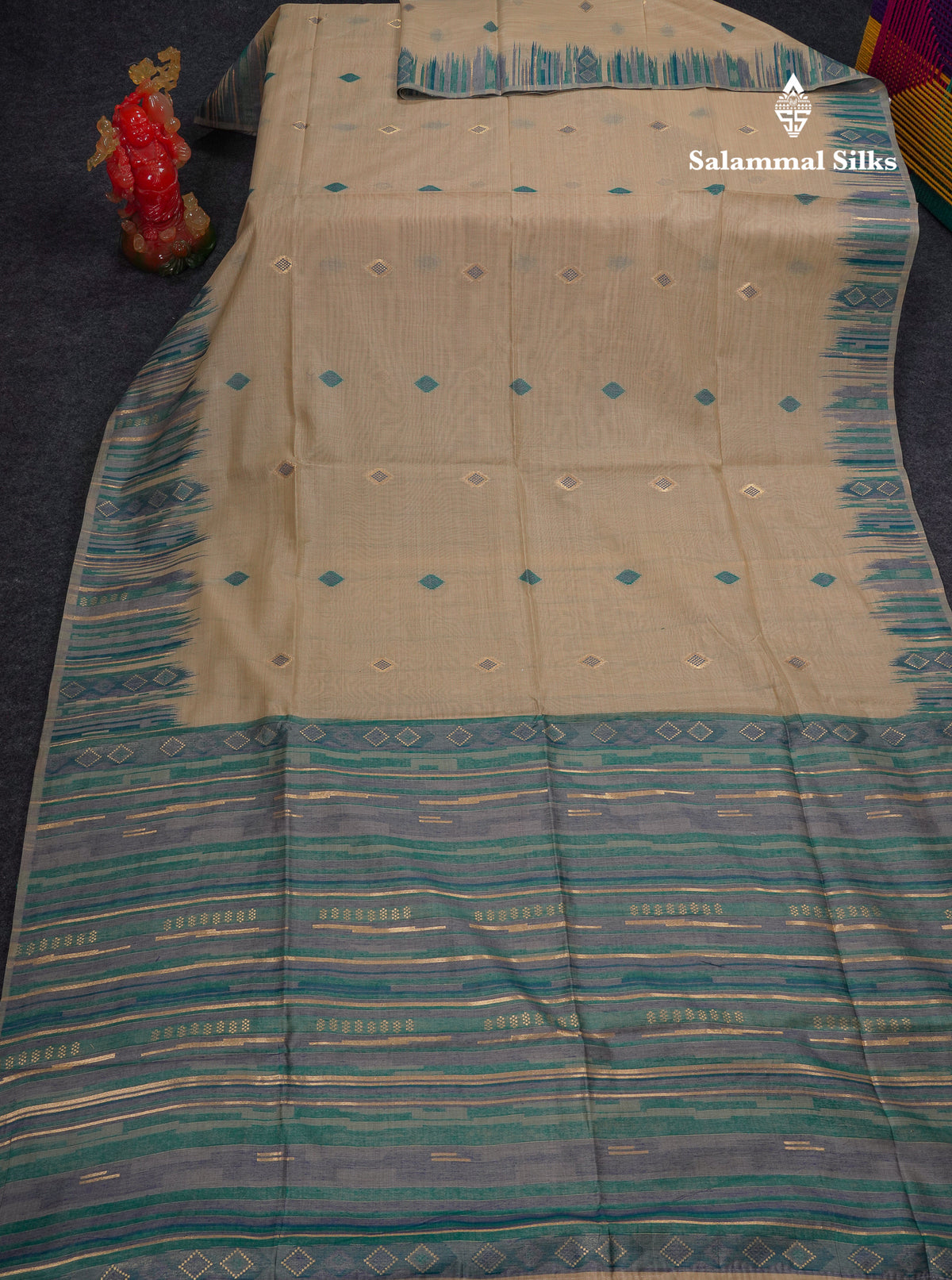 Beautiful Cream Sandal Muga Cotton Saree With Contrast Sapphire Green Blouse