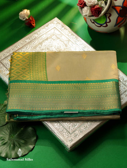 Beautiful Peacock Green Zari Butta Semi Silk Cotton Saree With Contrast Chilly Red Traditional Border