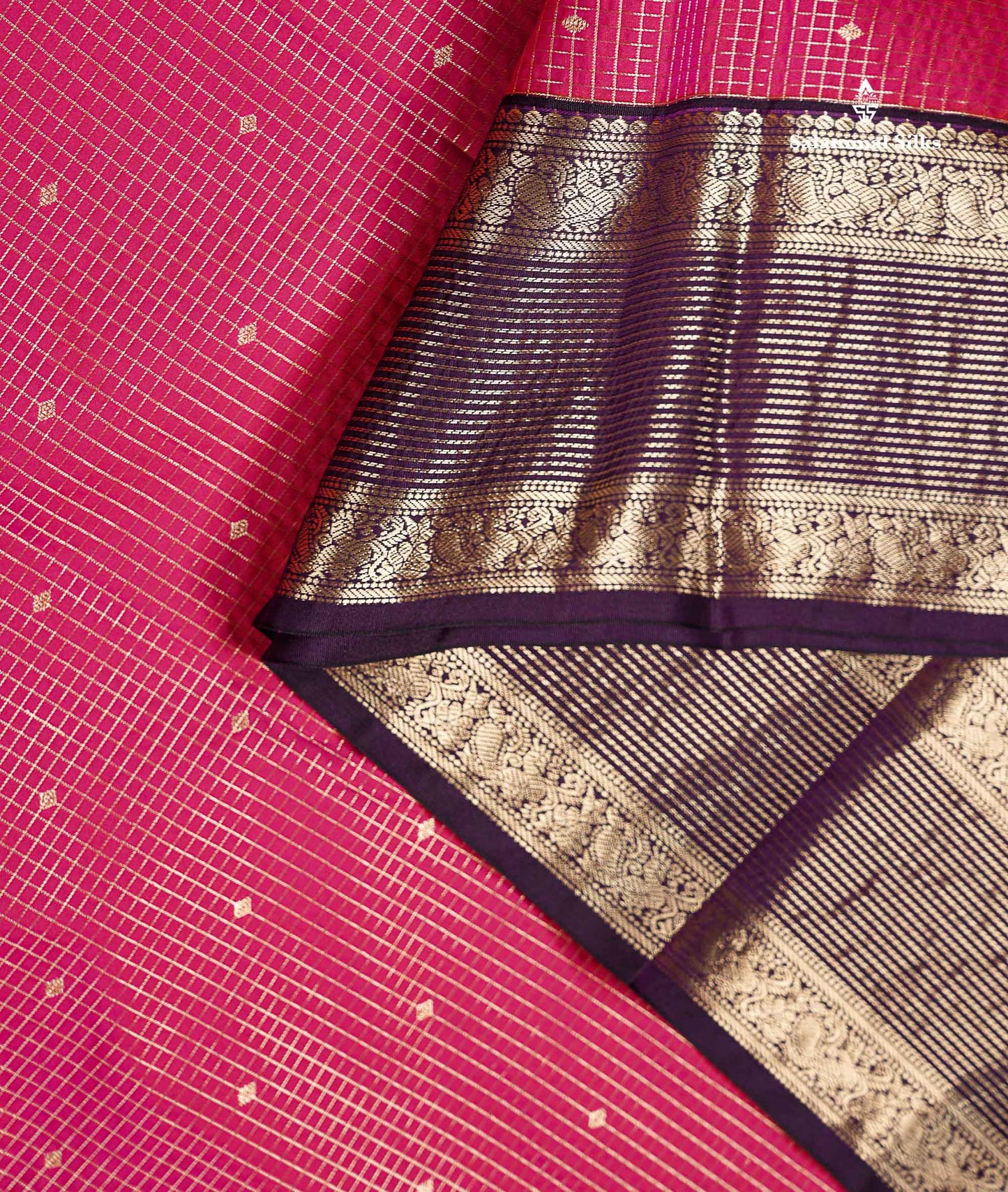 Semi Silk Saree - Dual Tone Pink Butta With Small Checks Along With Contrast Dark Purple Border