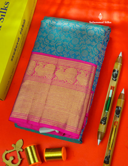 Pure zari Peacock Blue Pure Kanjivaram Silk Saree with Contrast Pink Traditional Border