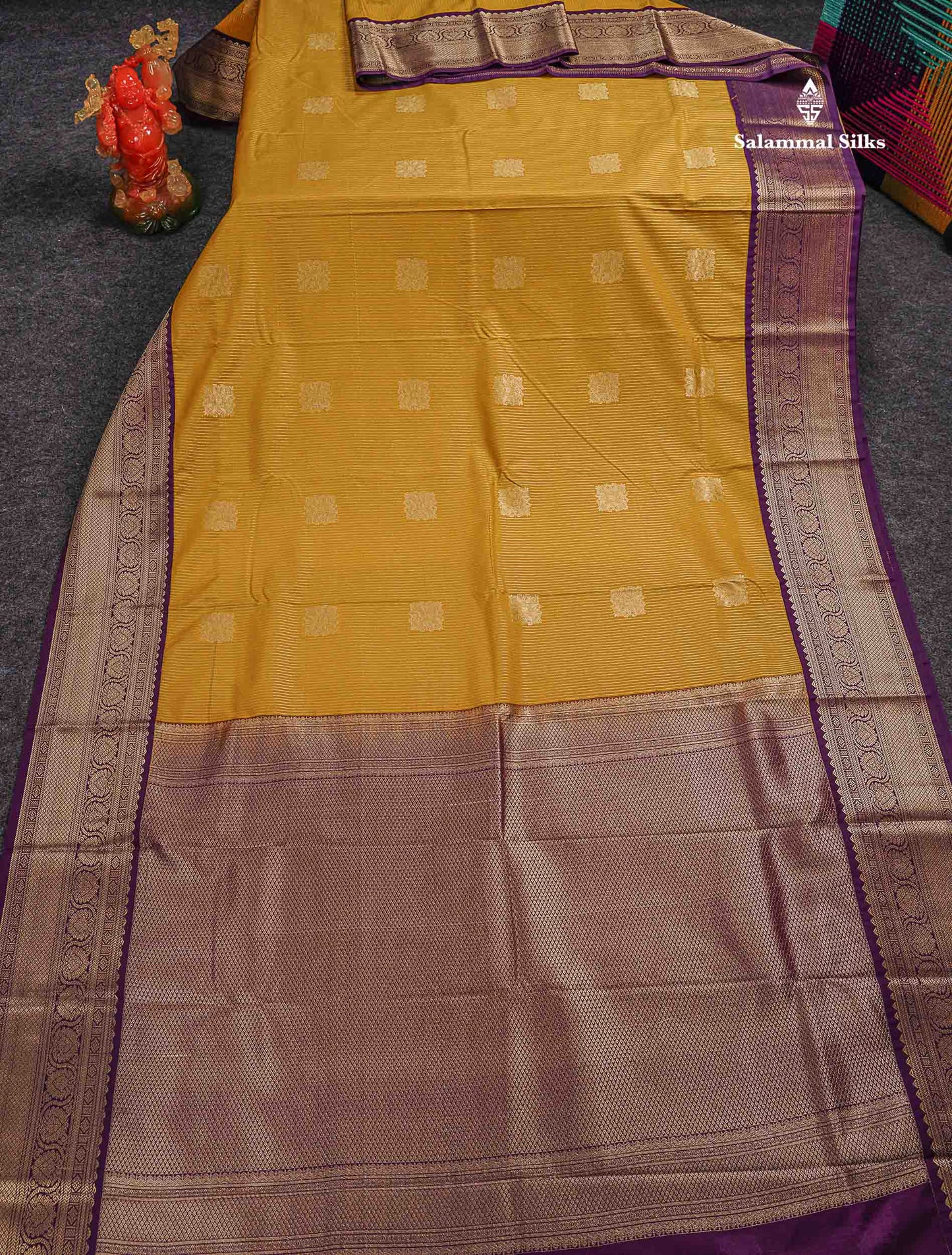 Semi Silk Saree - Mustard Yellow Butta With Lines Along With Contrast Dark Purple Border