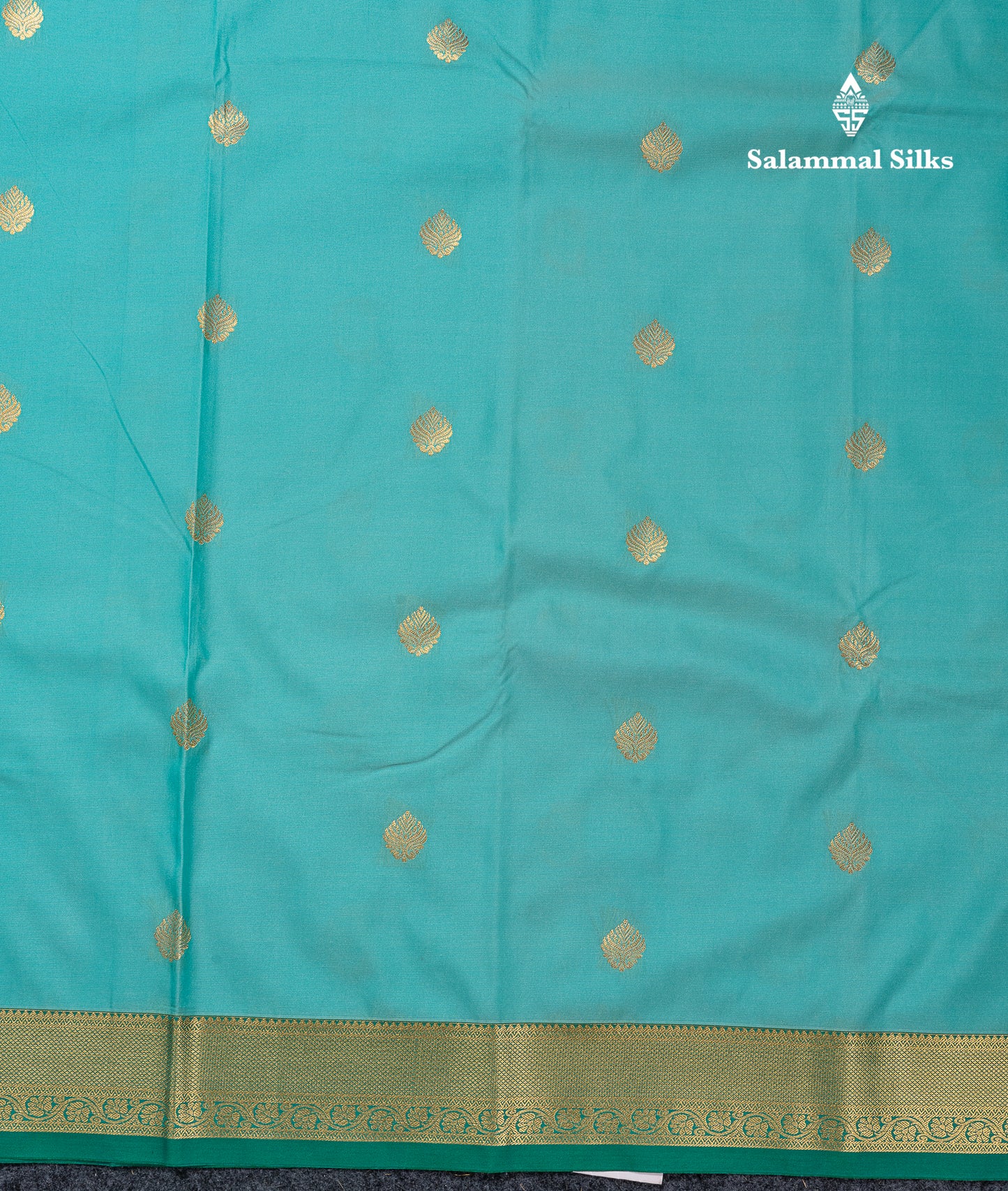Beautiful Orange Zari Buttas Semi Silk Saree With Contrast Peacock Green Small Border