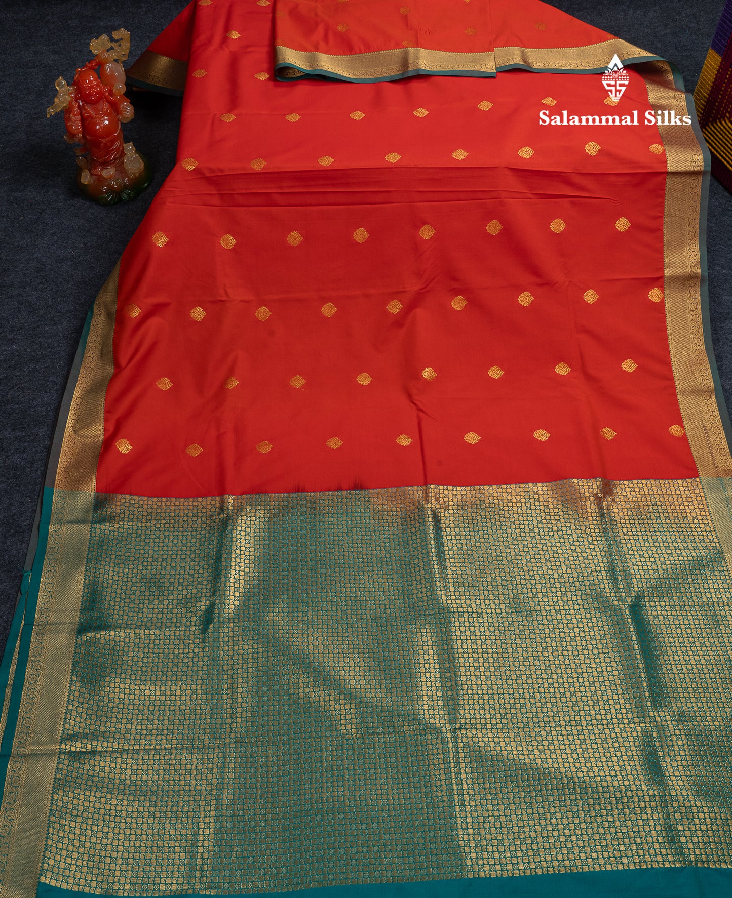 Beautiful Orange Zari Buttas Semi Silk Saree With Contrast Peacock Green Small Border
