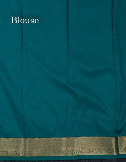 Beautiful Orange Zari Buttas Semi Silk Saree With Contrast Peacock Green Small Border