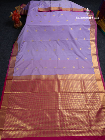 Beautiful Orange Zari Buttas Semi Silk Saree With Contrast Peacock Green Small Border