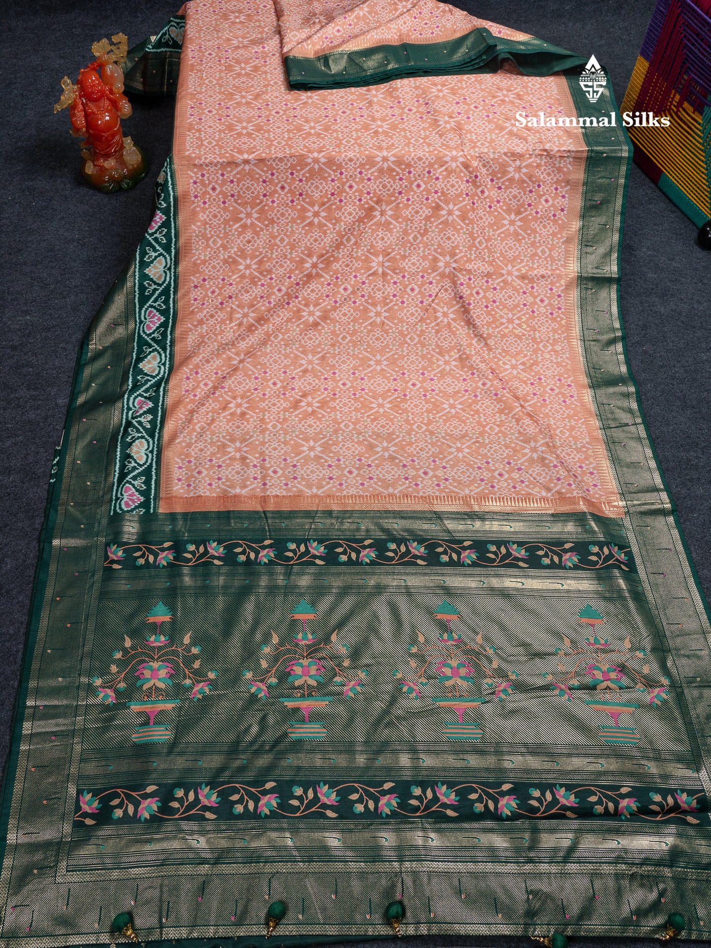 Beautiful Peach Ikkat Dola Fancy Saree With Bottle Green Border