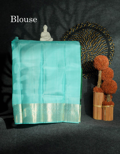 Beautiful Pure Silk Pattu Pavadai (Bottle Green) With Contrast Ice Blue Blouse 27"