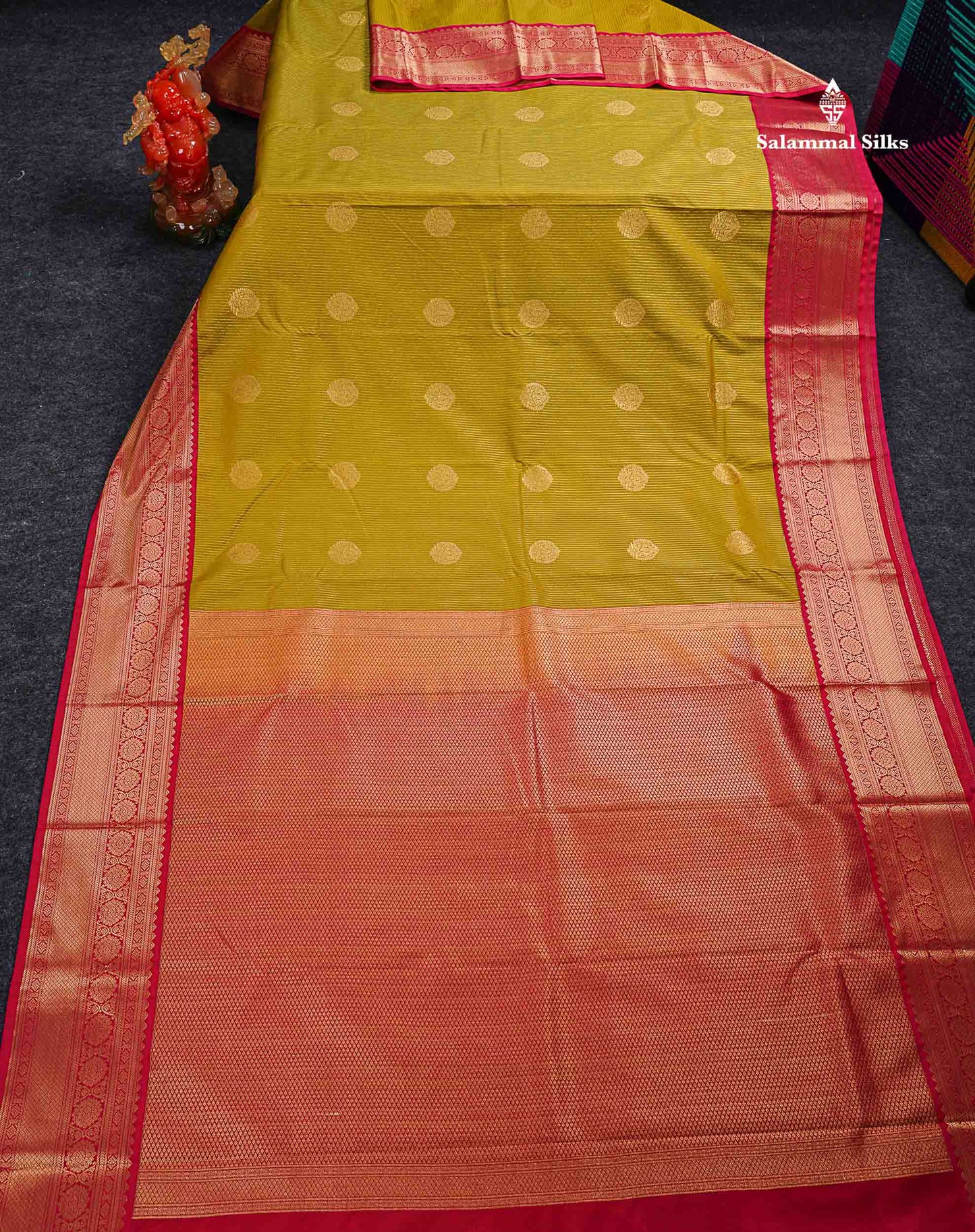 Semi Silk Saree - Mustard Yellow Butta With Lines Along With Contrast Redish Pink Traditional Border