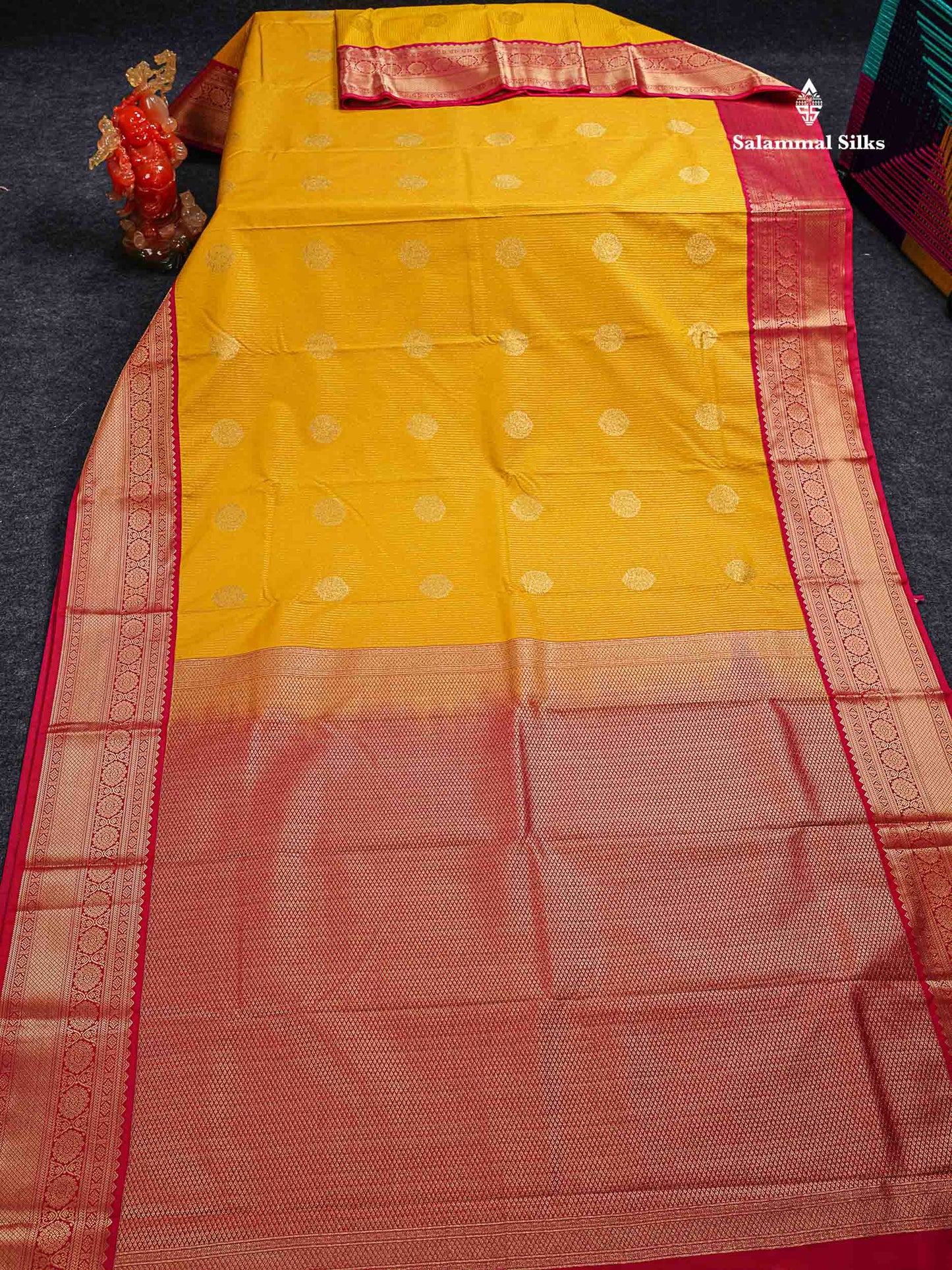 Semi Silk Saree - Mustard Yellow Butta With Lines Along With Contrast Redish Pink Traditional Border