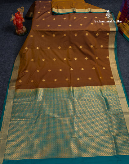 Beautiful Orange Zari Buttas Semi Silk Saree With Contrast Peacock Green Small Border