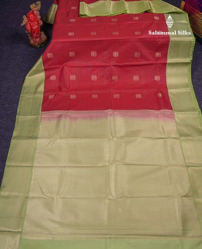 Beautiful Reddish Maroon Small Zari Checks With Butta Semi Silk Saree With Contrast Pista Green Border