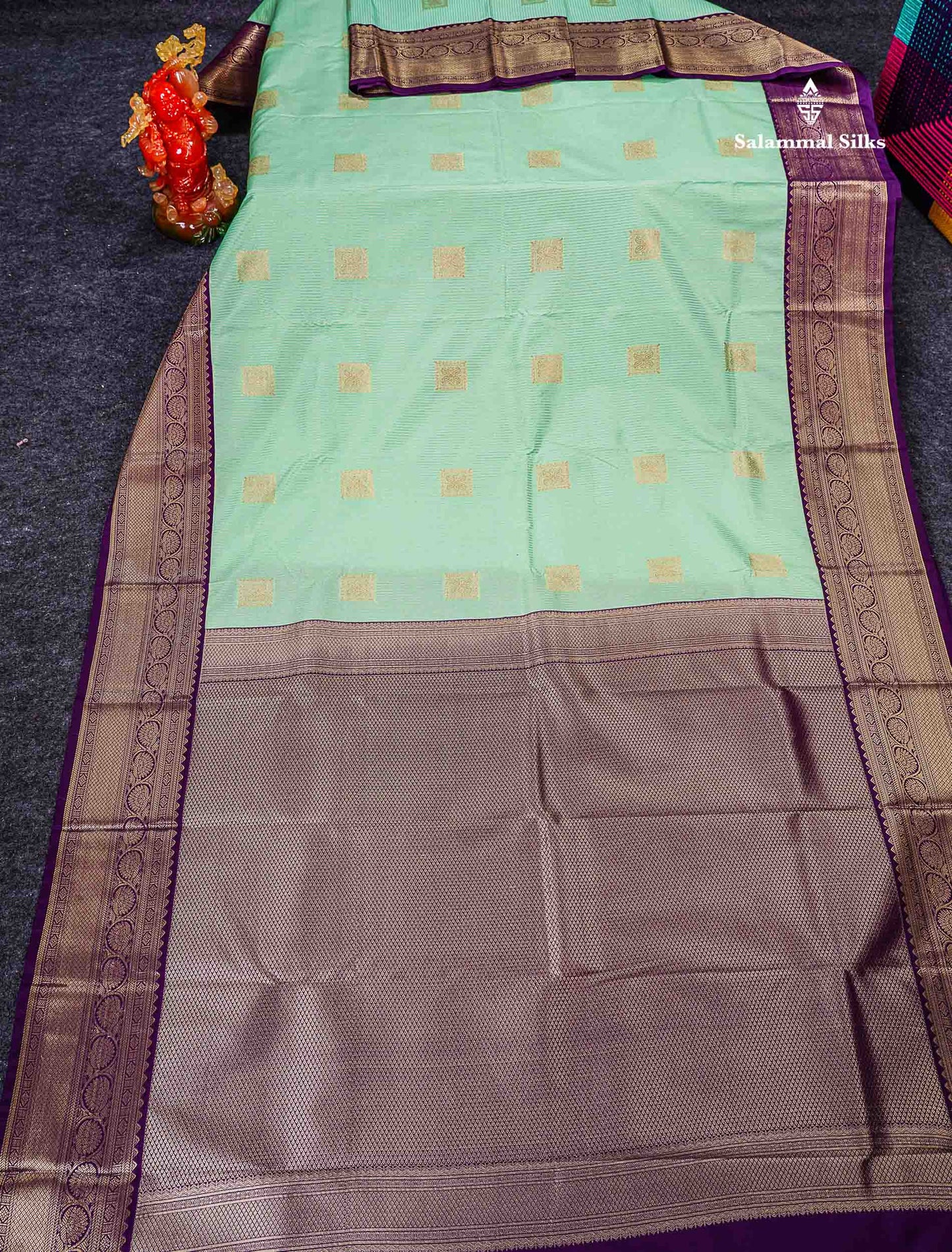 Semi Silk Saree - Rexona Green Butta With Lines Along With Contrast Dark Purple Traditional Border