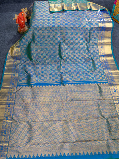 Dual Tone Peacock Blue Menakari Work Bridal Pure Kanjivaram Silk Saree With Traditional Border