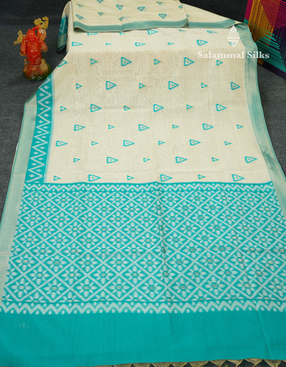 Elegant Cream Sandal Ikkat Style Cotton Mix Saree With Contrast Peacock Blue Border
