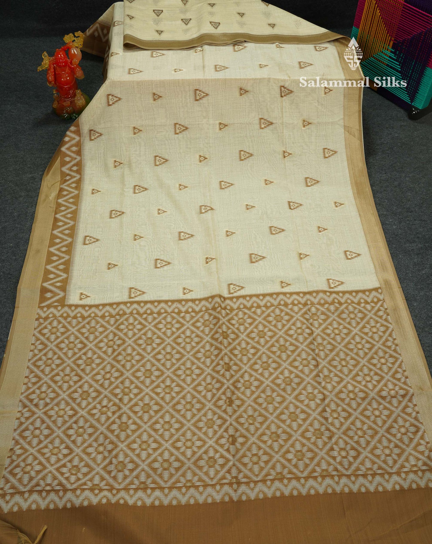 Elegant Cream Sandal Ikkat Style Cotton Mix Saree With Contrast Peacock Blue Border