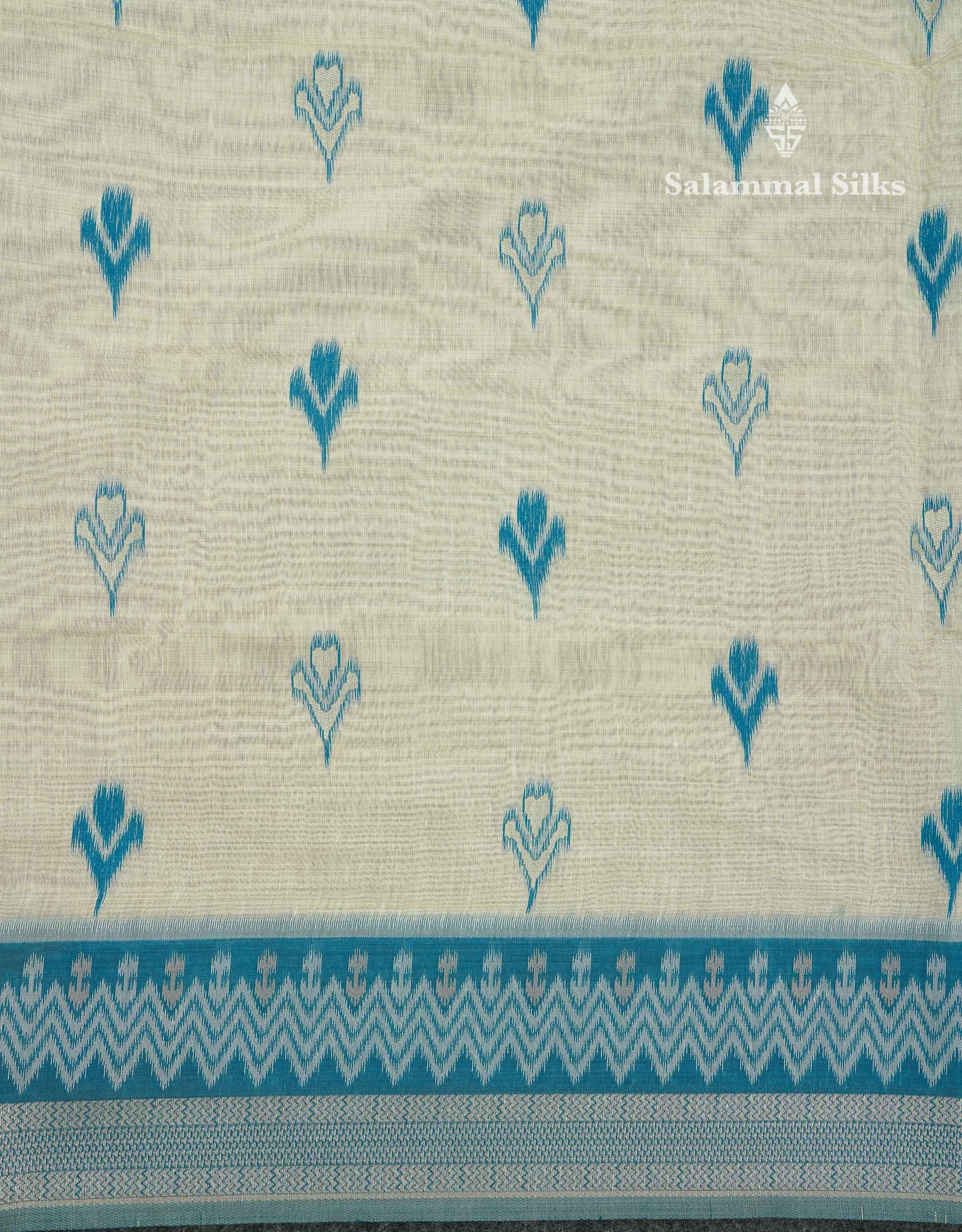 Elegant Cream Sandal Ikkat Style Cotton Mix Saree With Contrast Peacock Blue Border