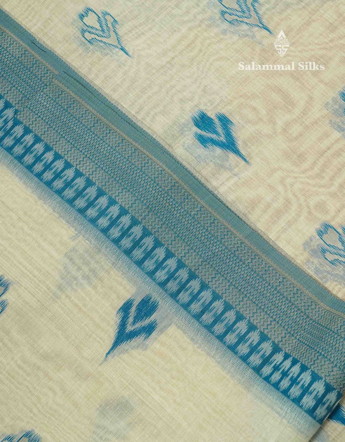 Elegant Cream Sandal Ikkat Style Cotton Mix Saree With Contrast Peacock Blue Border
