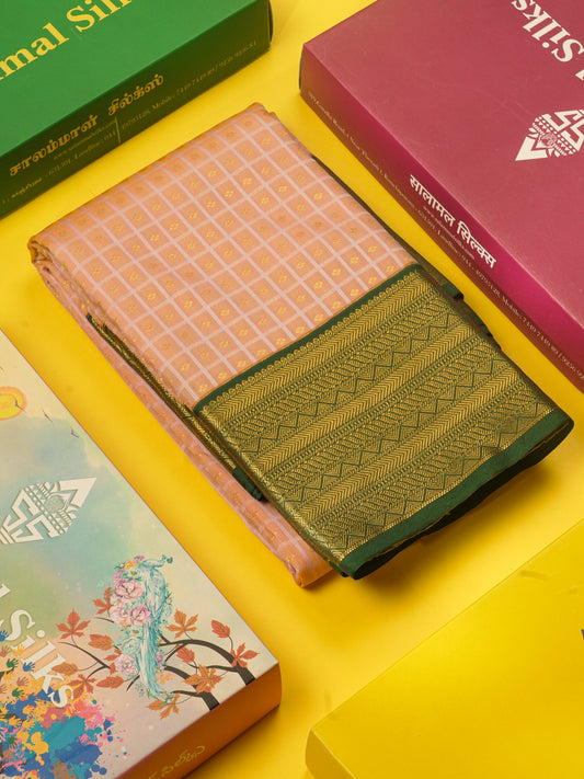 1000 Buttas Light Peach Semi Silk Saree With Contrast Bottle Green Border