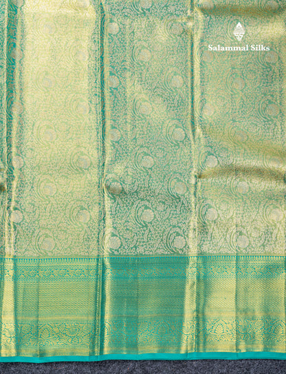 Light Green Tissue Bridal Pure Kanjivaram Silk Saree With Contrast Sapphire Green Traditional Border