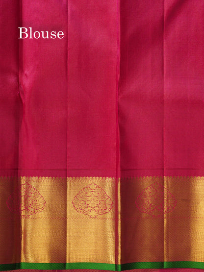Korvai Green Pure Kanjivaram Silk Saree With Contrast Magenta Border