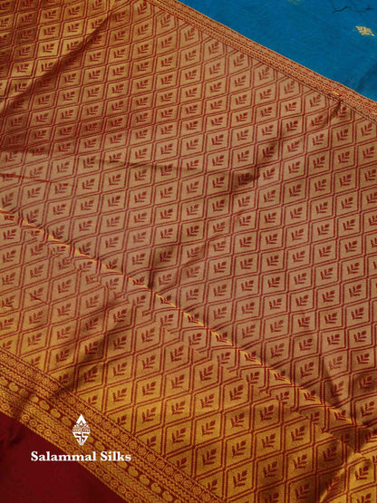 Beautiful Peacock Green Zari Butta Semi Silk Cotton Saree With Contrast Chilly Red Traditional Border