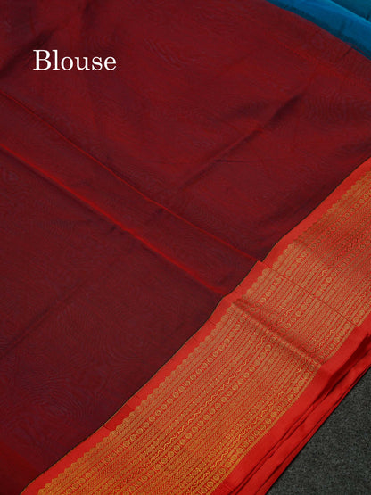 Beautiful Peacock Green Zari Butta Semi Silk Cotton Saree With Contrast Chilly Red Traditional Border