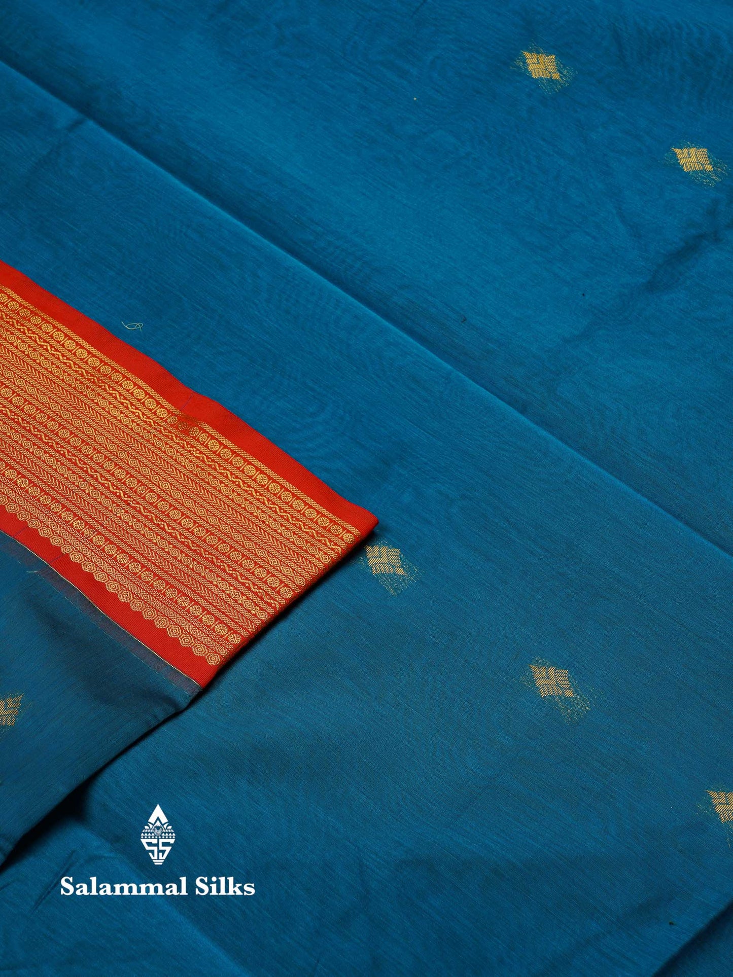Beautiful Peacock Green Zari Butta Semi Silk Cotton Saree With Contrast Chilly Red Traditional Border