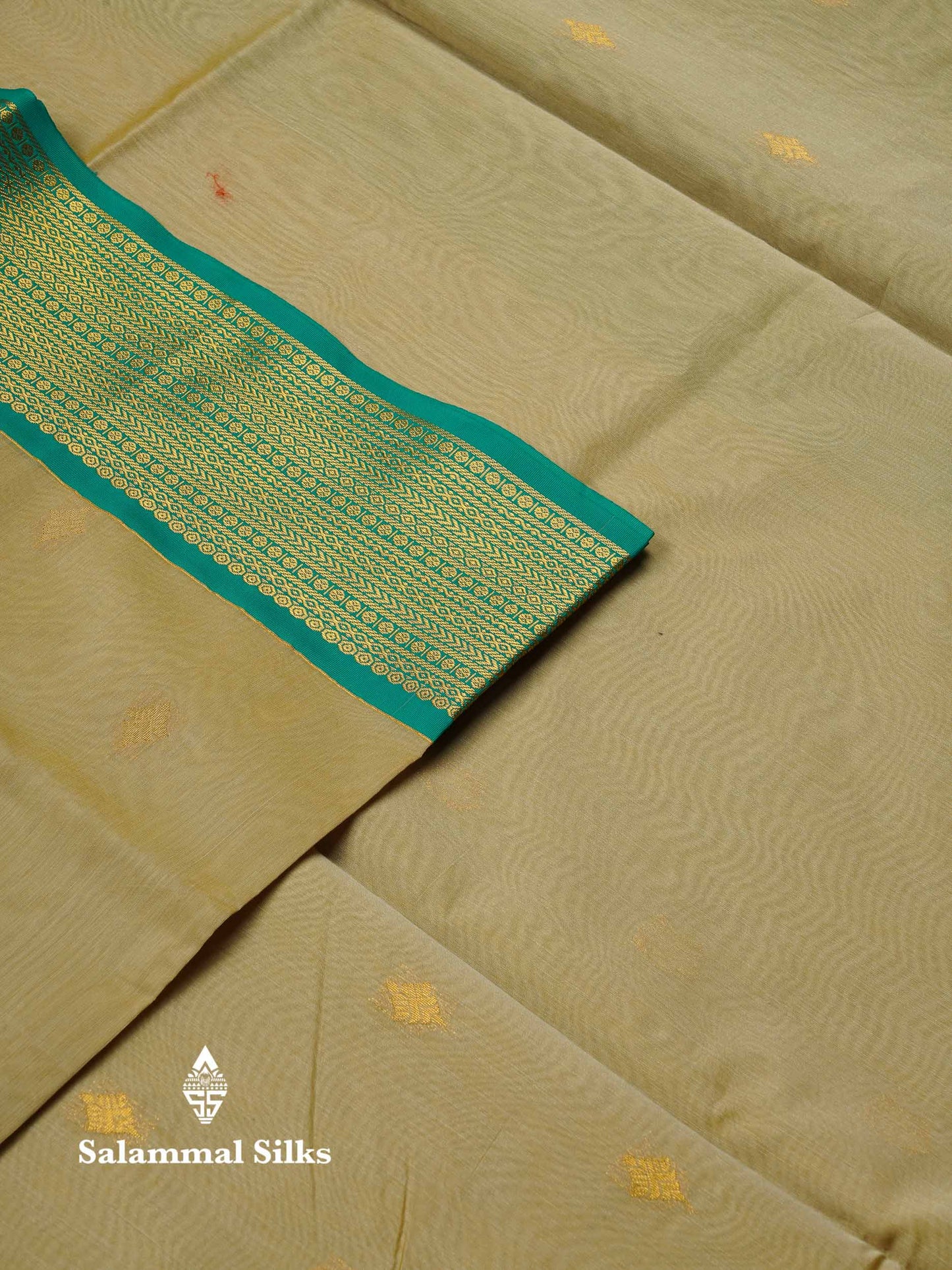 Beautiful Peacock Green Zari Butta Semi Silk Cotton Saree With Contrast Chilly Red Traditional Border