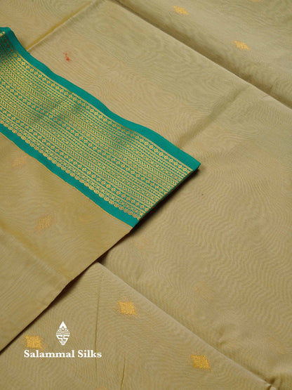 Beautiful Peacock Green Zari Butta Semi Silk Cotton Saree With Contrast Chilly Red Traditional Border
