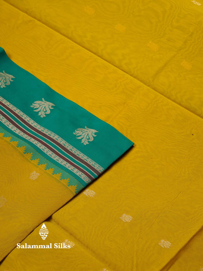 Beautiful Lemon Yellow Zari Butta Semi Silk Cotton Saree With Contrast Sapphire Green Traditional Border