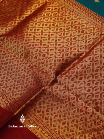 Beautiful Peacock Green Zari Butta Semi Silk Cotton Saree With Contrast Chilly Red Traditional Border
