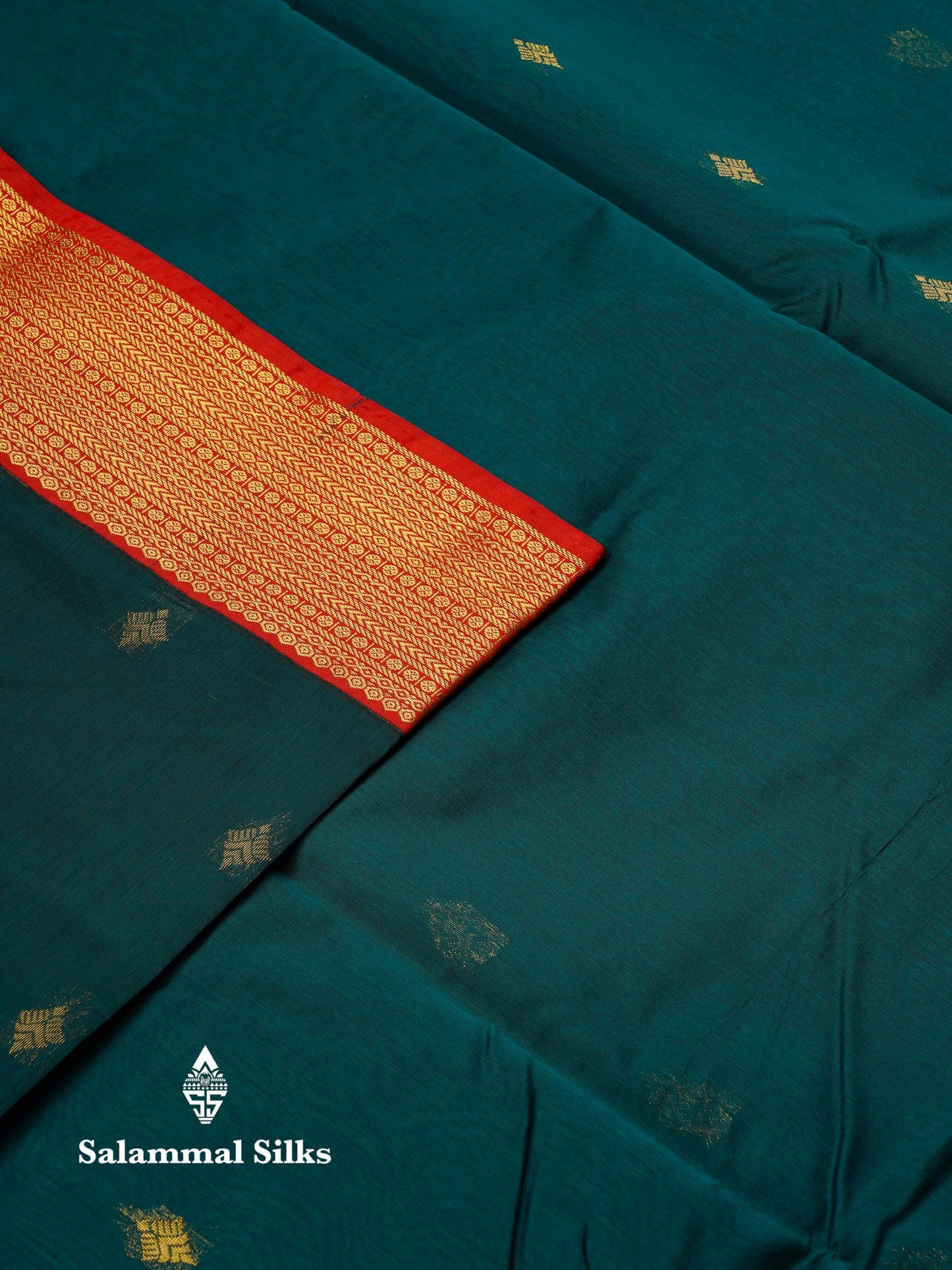 Beautiful Peacock Green Zari Butta Semi Silk Cotton Saree With Contrast Chilly Red Traditional Border